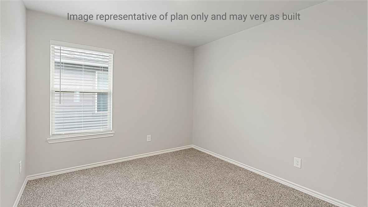 1411 Choctaw Road Sinton, TX 78387 - Photo 13 of 28 a view of an empty room with a window