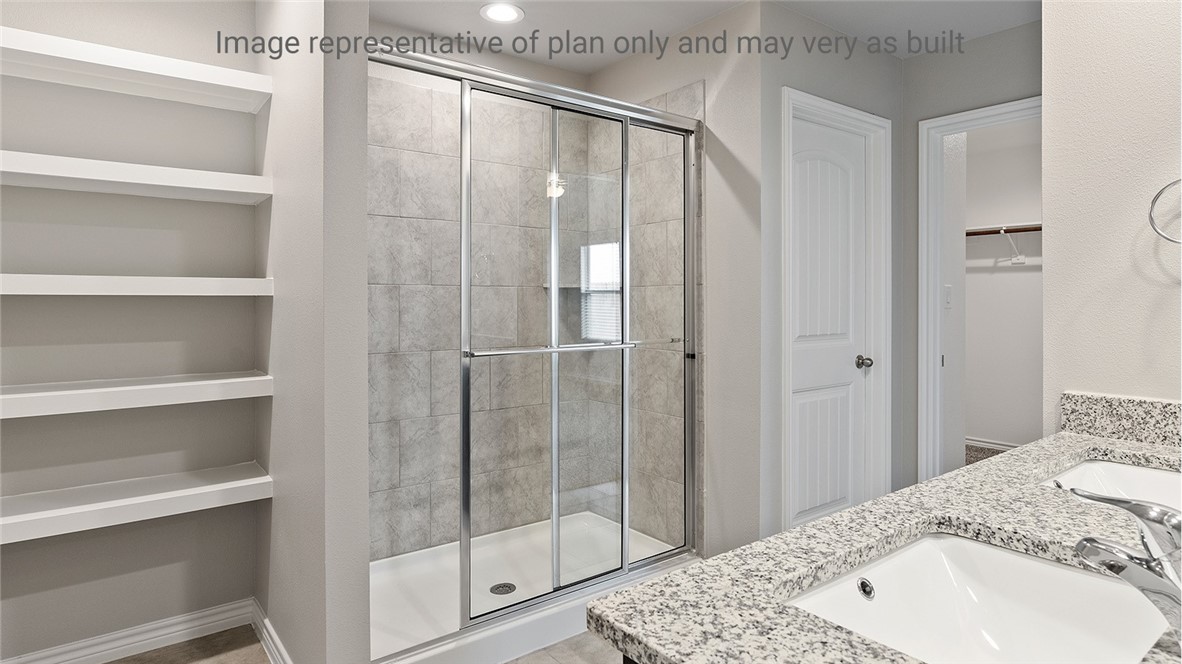 1411 Choctaw Road Sinton, TX 78387 - Photo 17 of 28 a bathroom with a shower and a sink