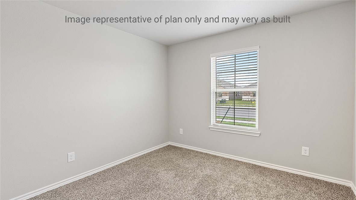 1411 Choctaw Road Sinton, TX 78387 - Photo 10 of 28 a view of an empty room with a window