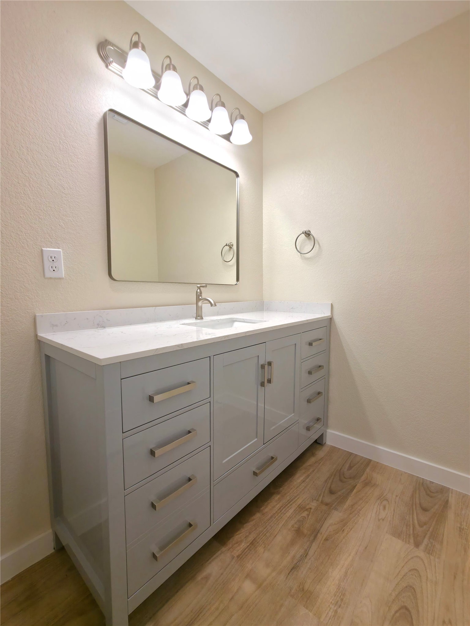 109 Cernosek Road La Grange, TX 78945 - Photo 15 of 32 a bathroom with a double vanity sink and a mirror