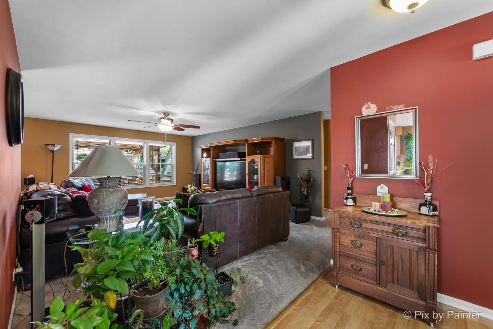 336 Claire Lane Cary, IL 60013 - Photo 13 of 29 a living room with furniture and a flat screen tv