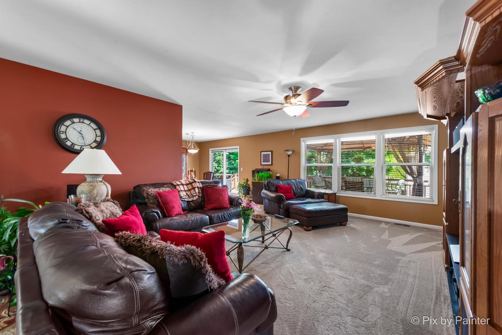 336 Claire Lane Cary, IL 60013 - Photo 14 of 29 a living room with furniture and a large window