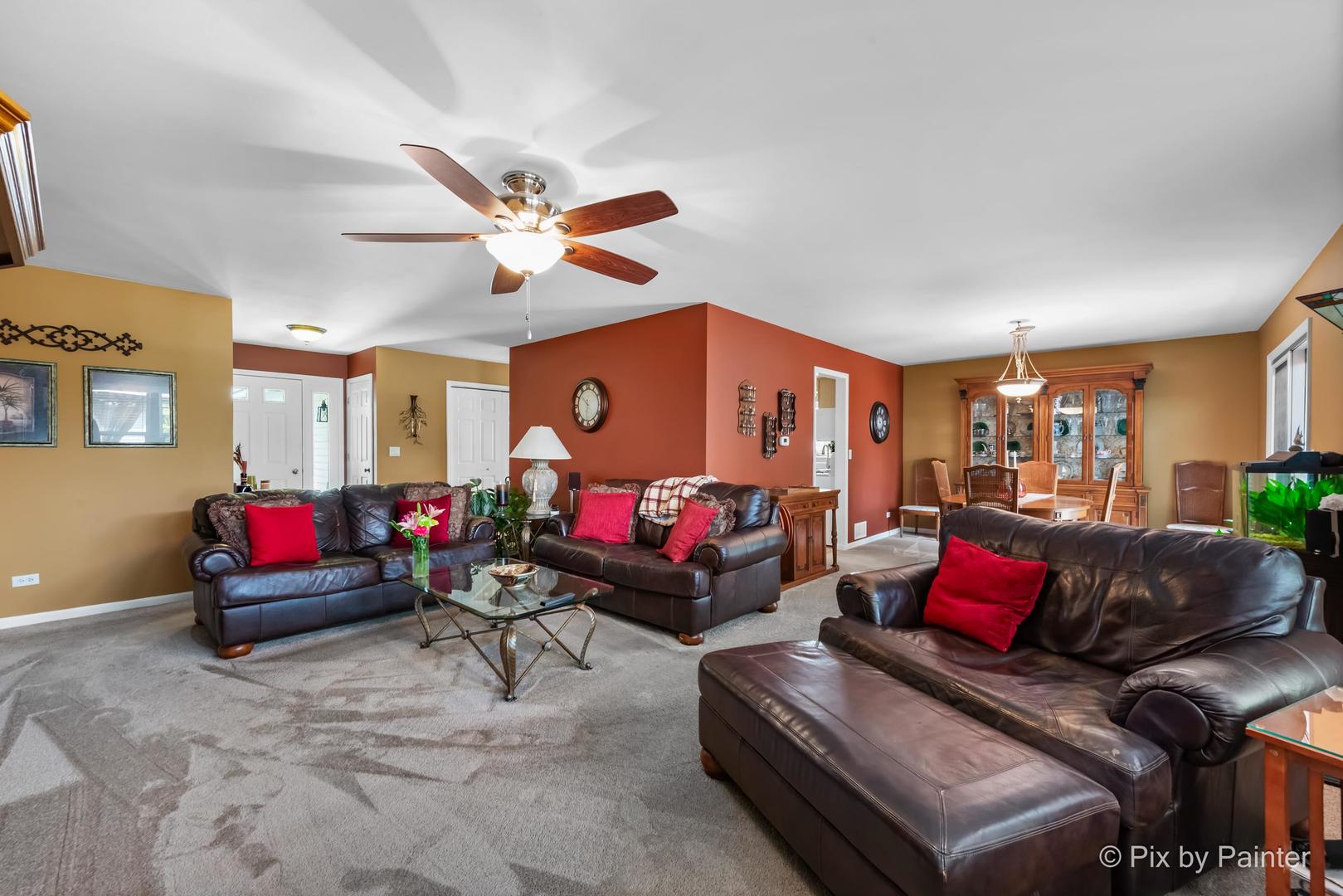 336 Claire Lane Cary, IL 60013 - Photo 16 of 29 a living room with furniture and a couch