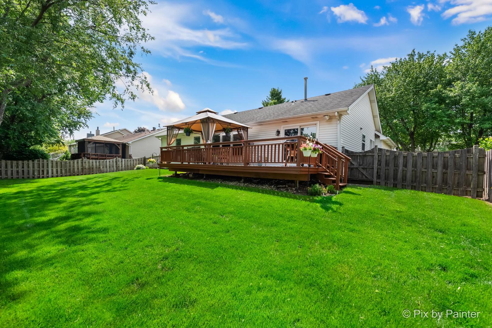 336 Claire Lane Cary, IL 60013 - Photo 4 of 29 a front view of a house with garden