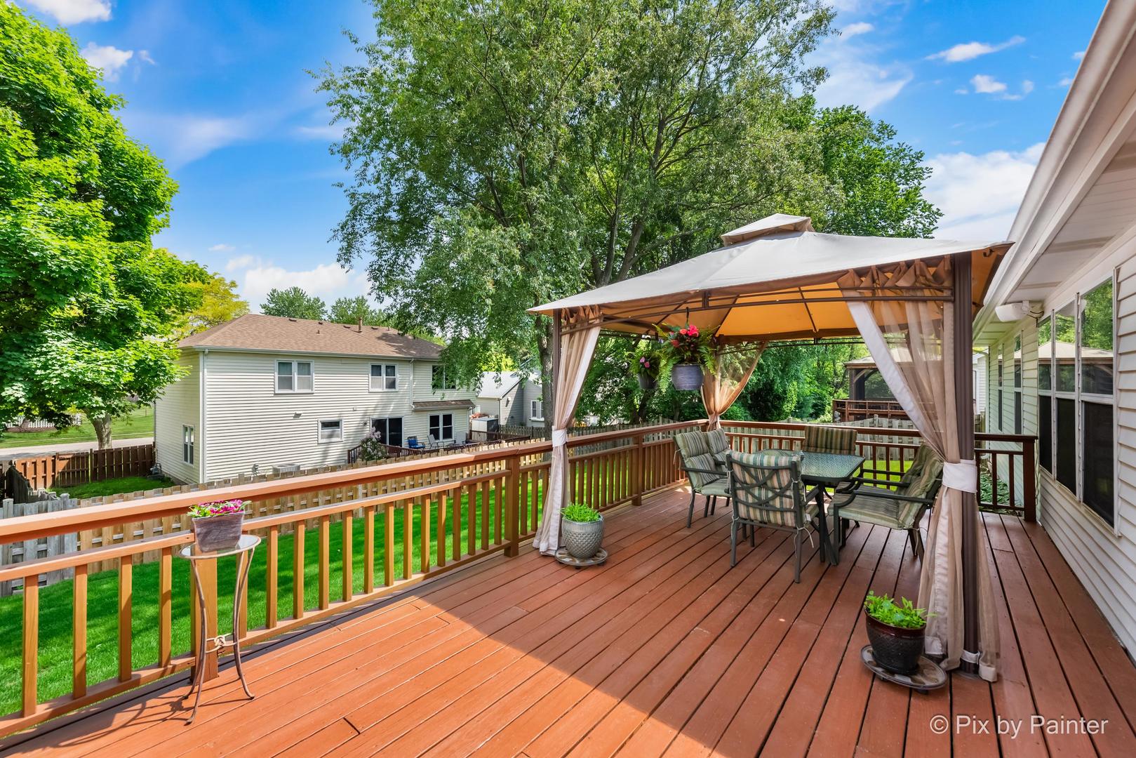 336 Claire Lane Cary, IL 60013 - Photo 9 of 29 a view of house with a roof deck
