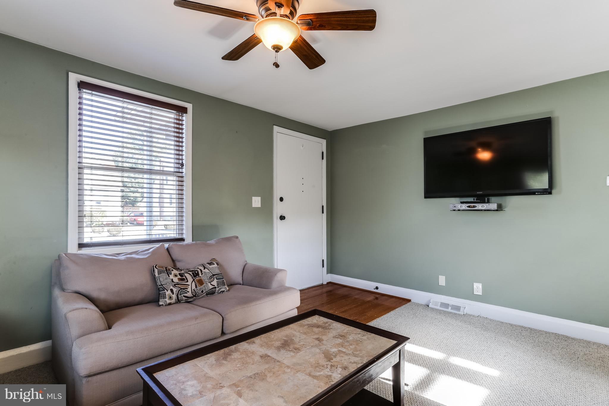 2015 Oakland Road Baltimore, MD 21220 - Photo 8 of 30 Living Room at Entry of Home Open to Kitchen