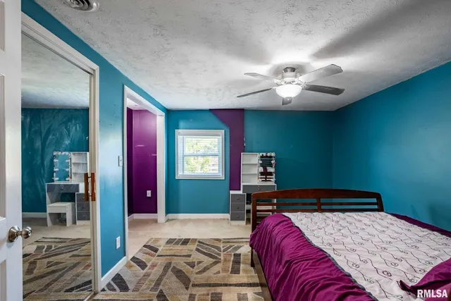 a view of a chairs and table in balcony