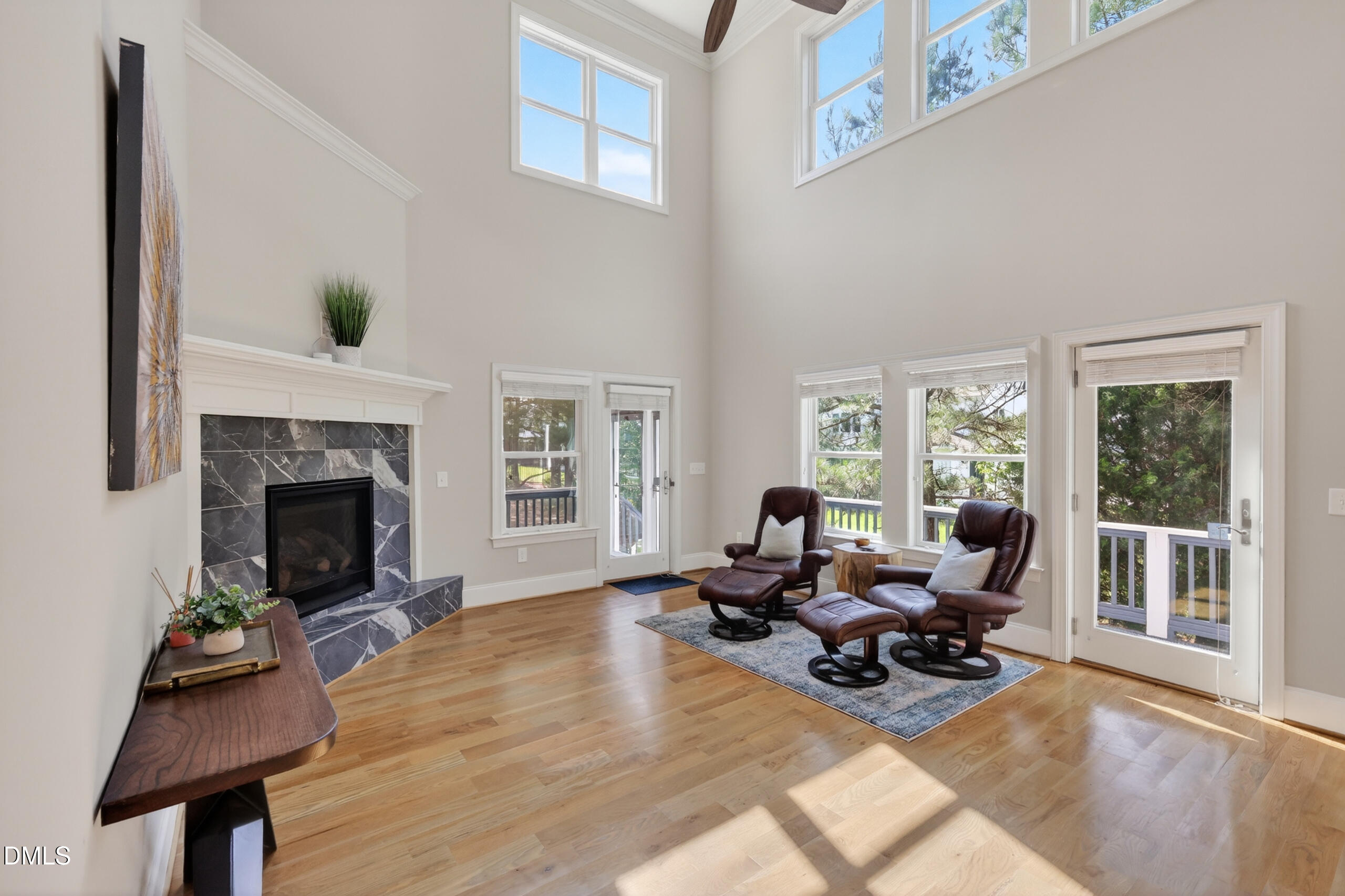 261 Character Drive Rolesville, NC 27571 - Photo 3 of 77 a living room with furniture and a fireplace