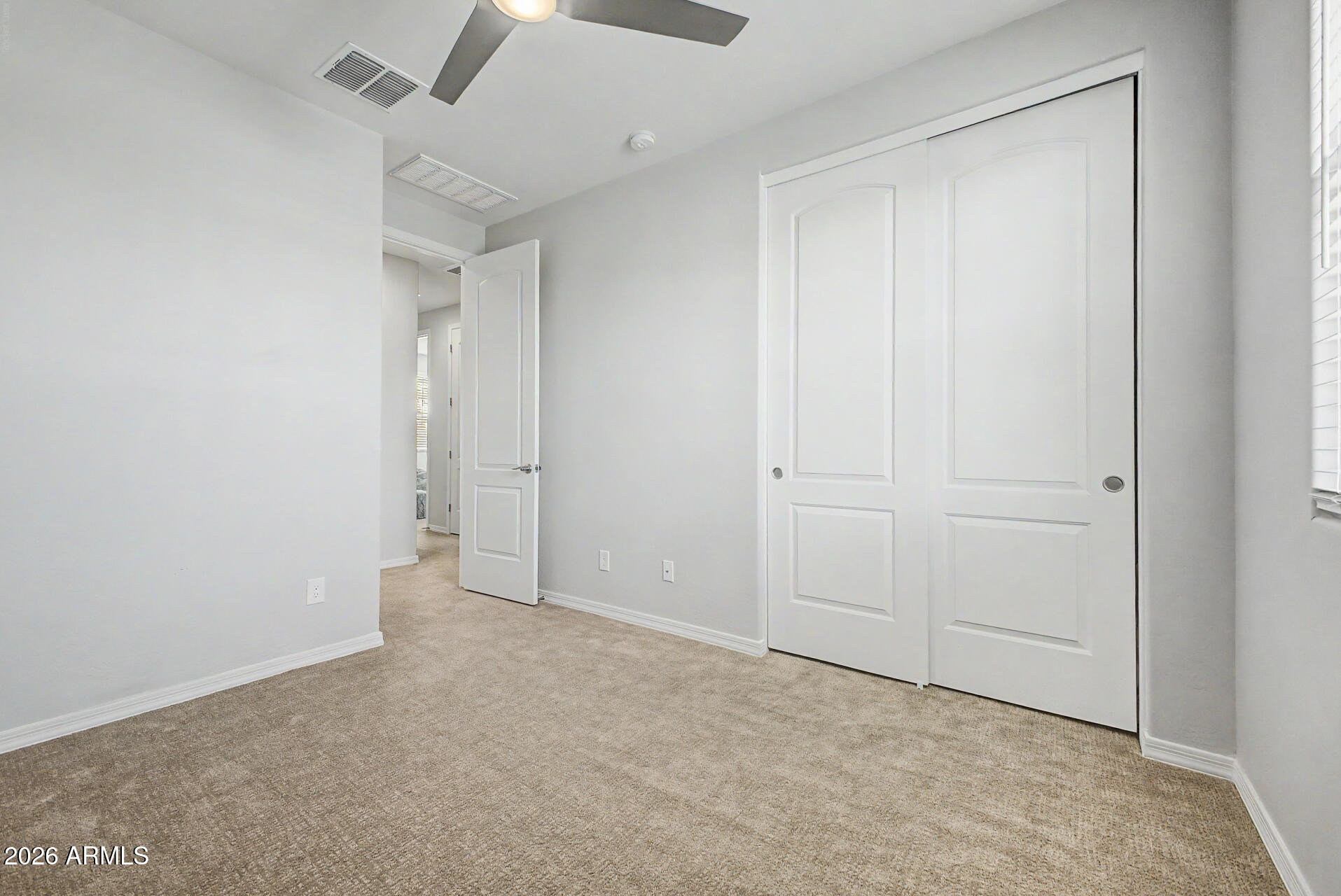 2583 South Entwistle Street Gilbert, AZ 85295 - Photo 22 of 42 an empty room with closet area
