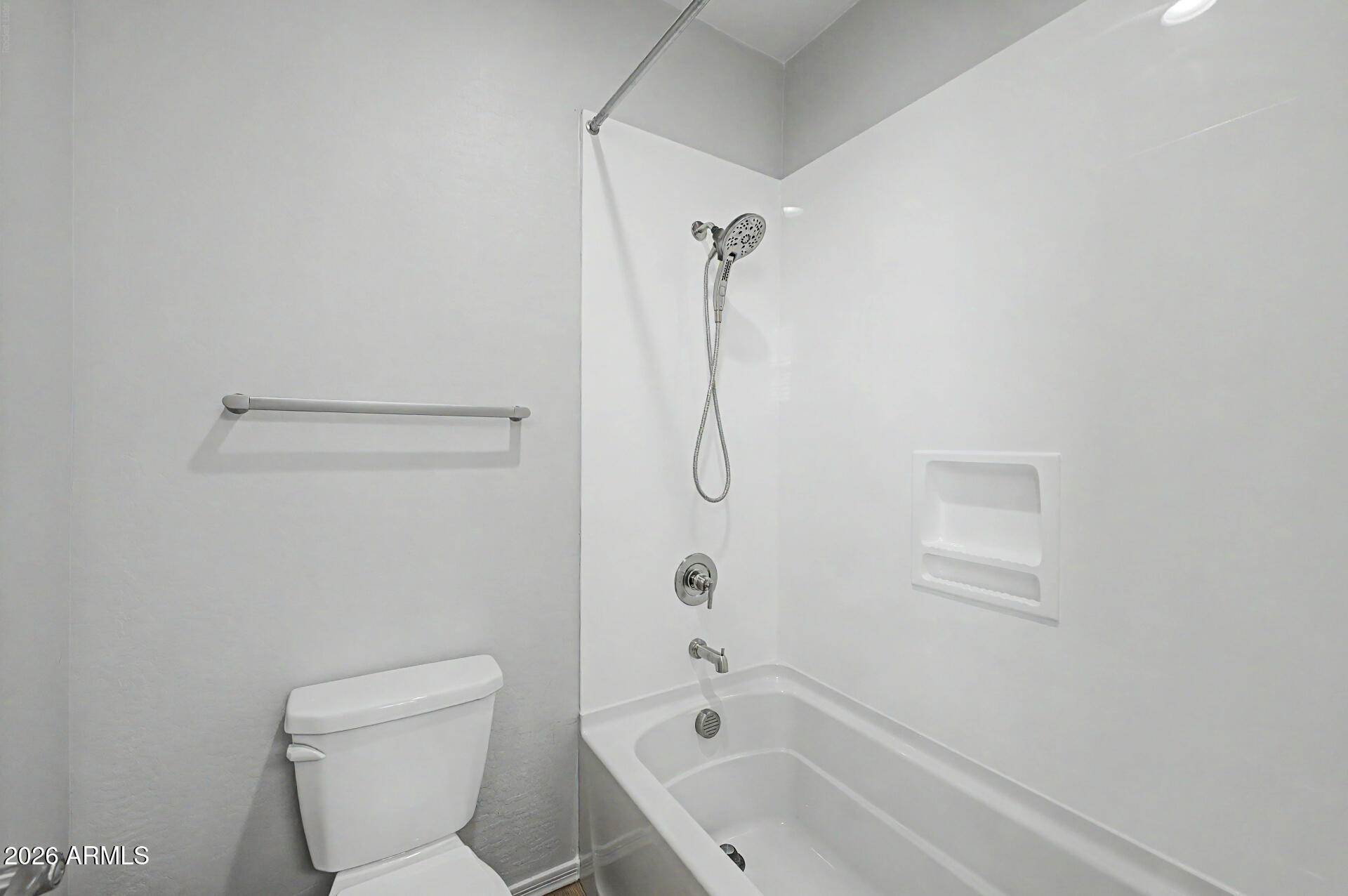 2583 South Entwistle Street Gilbert, AZ 85295 - Photo 24 of 42 a bathroom with a toilet and shower