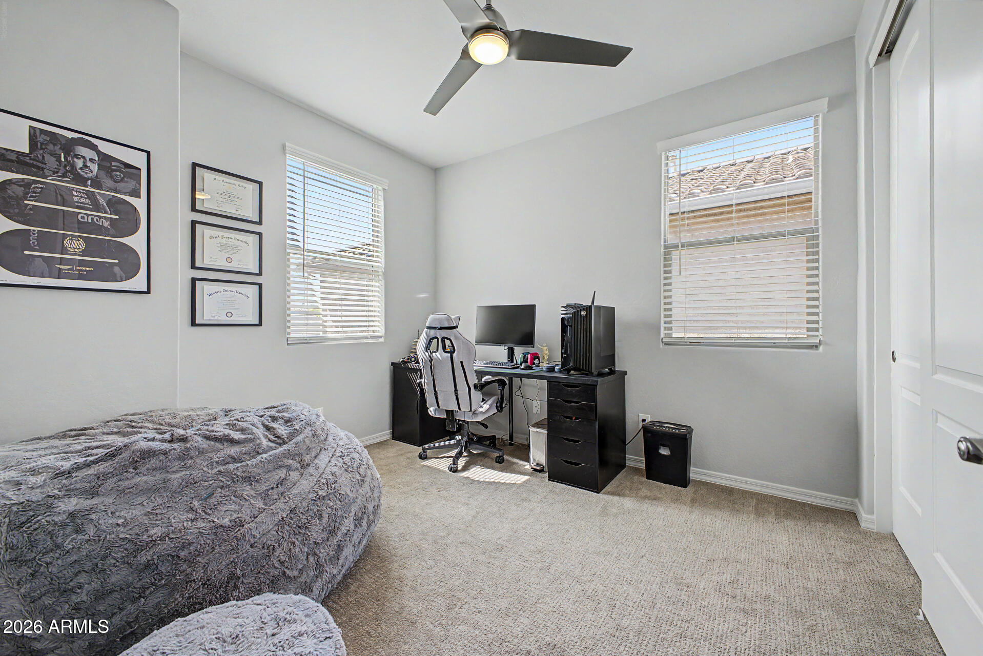 2583 South Entwistle Street Gilbert, AZ 85295 - Photo 25 of 42 a bedroom with a bed and furniture