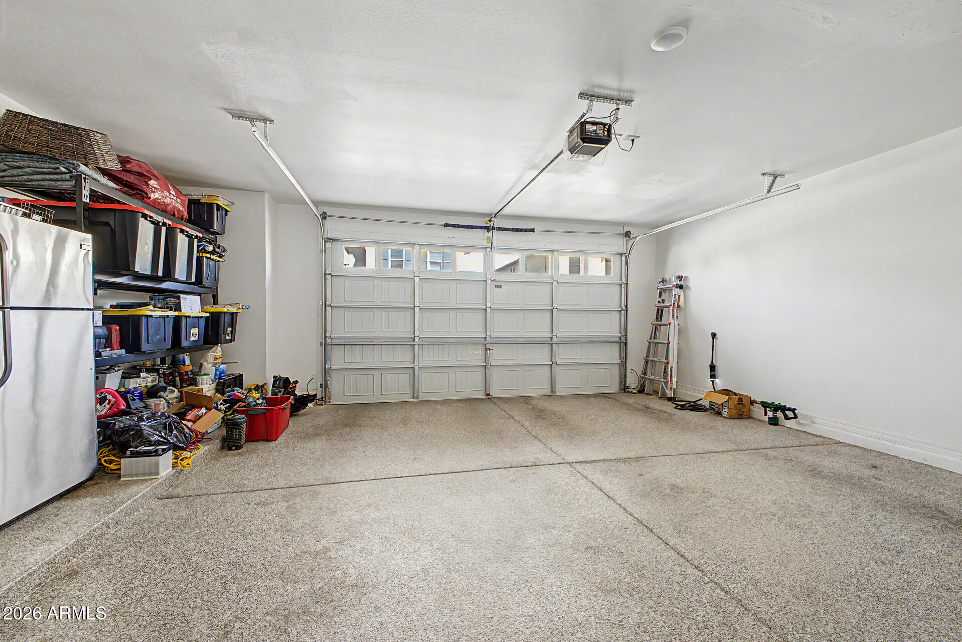 2583 South Entwistle Street Gilbert, AZ 85295 - Photo 36 of 42 a view of a garage with rack and bicycle