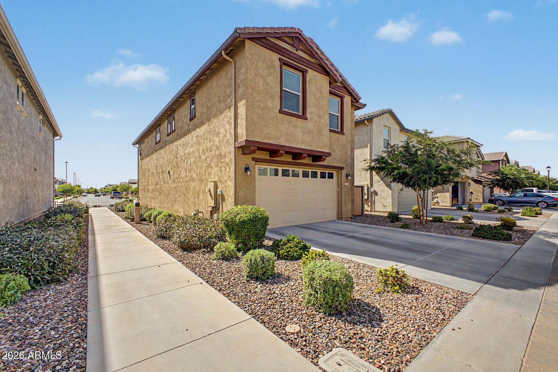 2583 South Entwistle Street Gilbert, AZ 85295 - Photo 38 of 42 a front view of a house with a yard