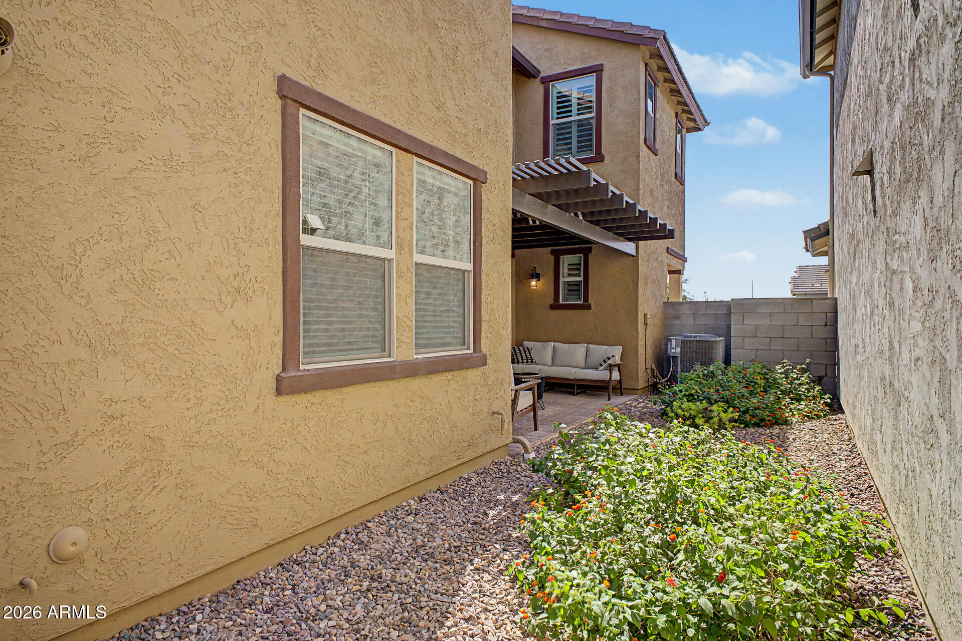 2583 South Entwistle Street Gilbert, AZ 85295 - Photo 42 of 42 a house view with a garden space