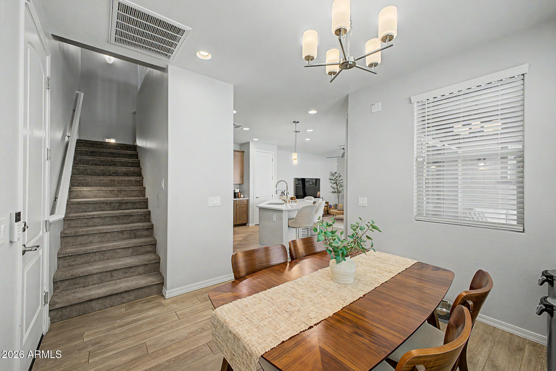 2583 South Entwistle Street Gilbert, AZ 85295 - Photo 6 of 42 a view of a dining room with furniture