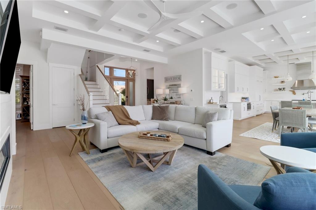 1300 Cobia Court Naples, FL 34102 - Photo 5 of 41 a living room with furniture and a large window