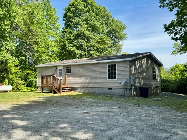 385 V C Pk Road Marble, NC 28905 - Photo 1 of 19 a view of a house with backyard and trees