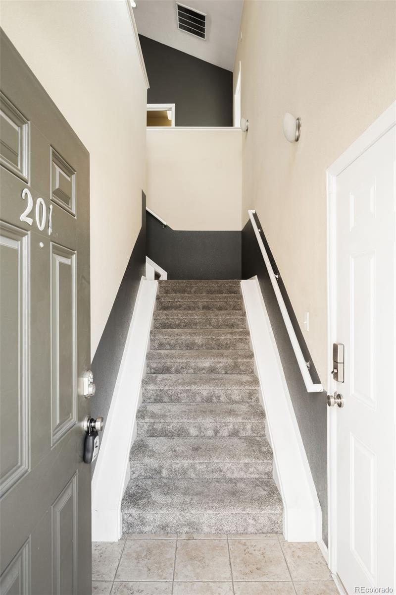 2240 South Vaughn Way, Unit 201 Aurora, CO 80014 - Photo 4 of 34 a view of entryway