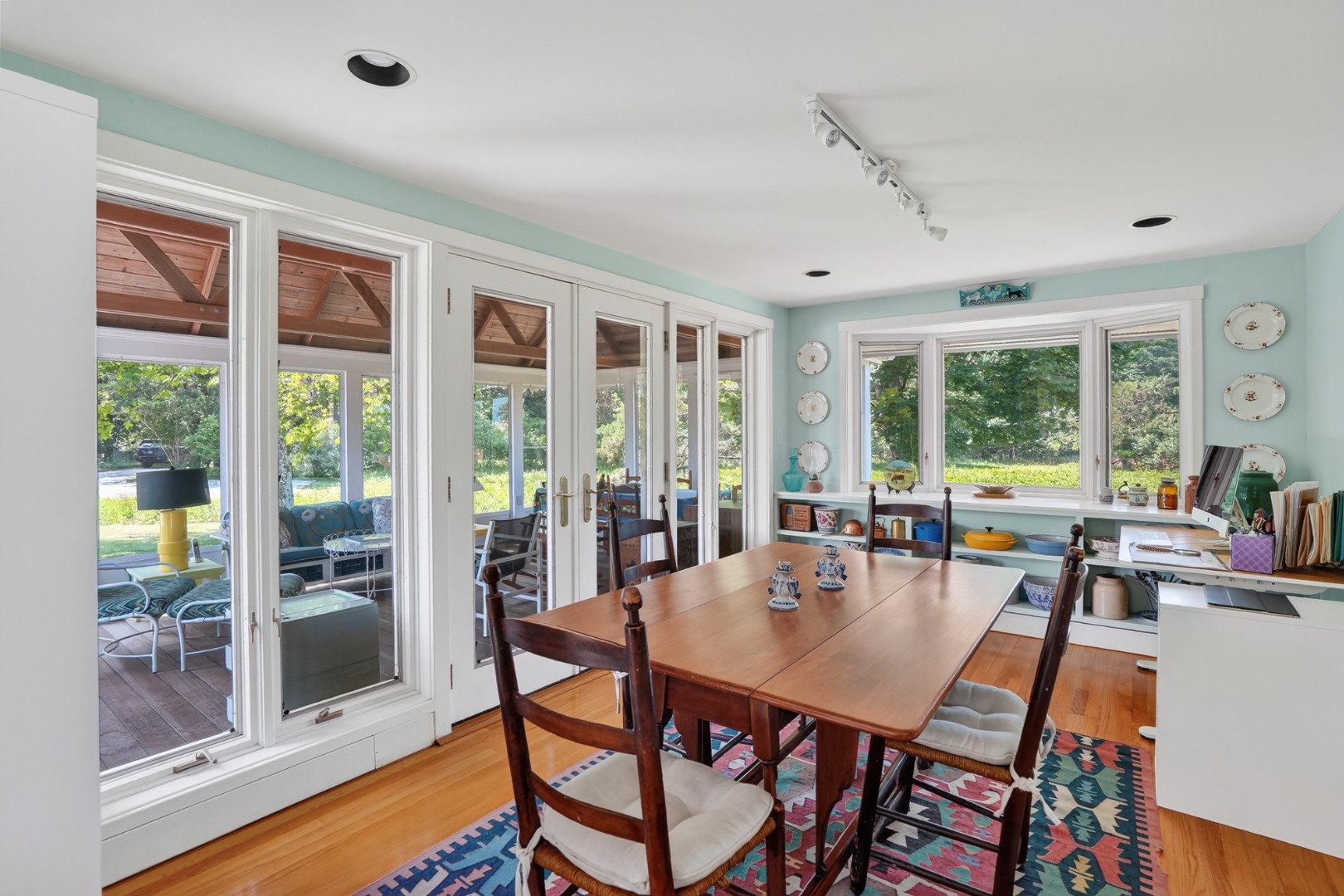 30 Elias Lane West Tisbury, MA 02568 - Photo 11 of 18 The dining room opens onto the sunroom/porch.