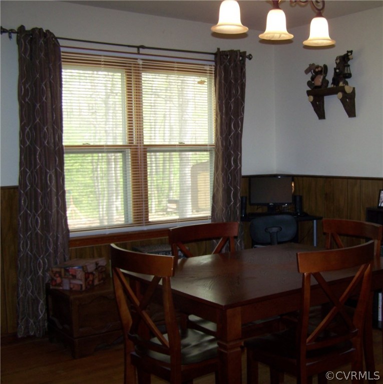 2383 Sizer Road Beaverdam, VA 23015 - Photo 12 of 29 a view of a dining room with furniture and chandelier