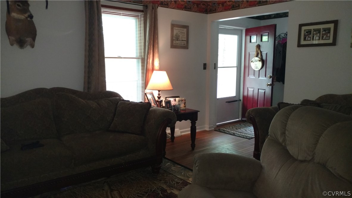 2383 Sizer Road Beaverdam, VA 23015 - Photo 15 of 29 a living room with furniture and a window