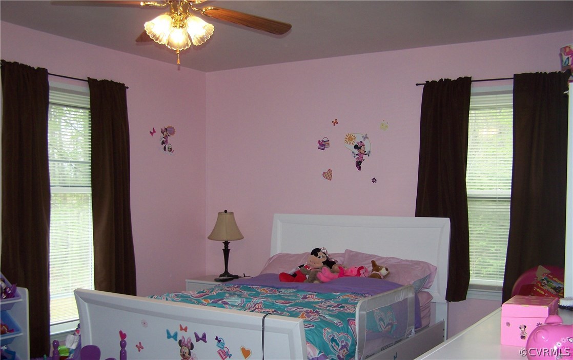 2383 Sizer Road Beaverdam, VA 23015 - Photo 21 of 29 a bedroom with furniture and a bed