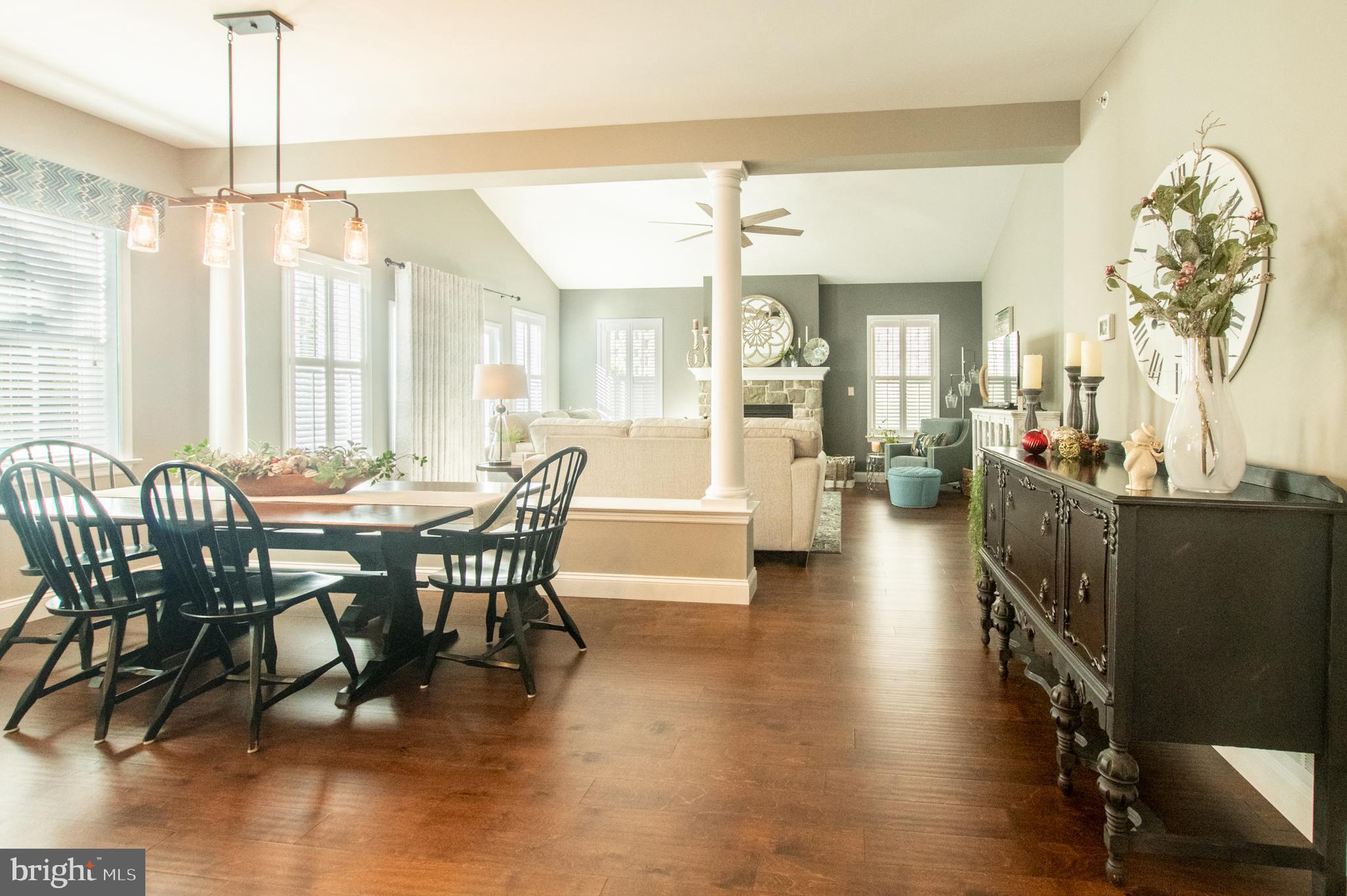 1247 South Red Maple Way Downingtown, PA 19335 - Photo 17 of 32 a view of a dining room with furniture window and wooden floor