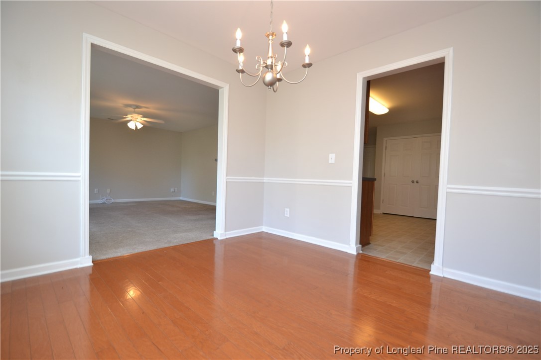 1428 Cricket Ridge Drive Raleigh, NC 27610 - Photo 13 of 47 wooden floor in an empty room