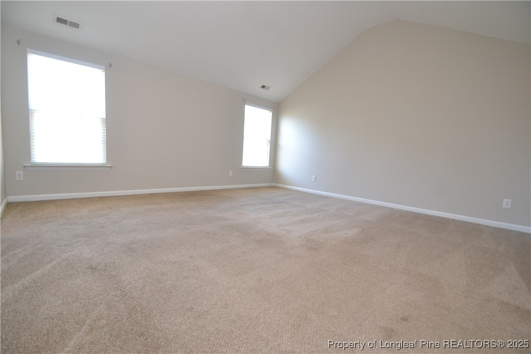 1428 Cricket Ridge Drive Raleigh, NC 27610 - Photo 23 of 47 an empty room that has a window