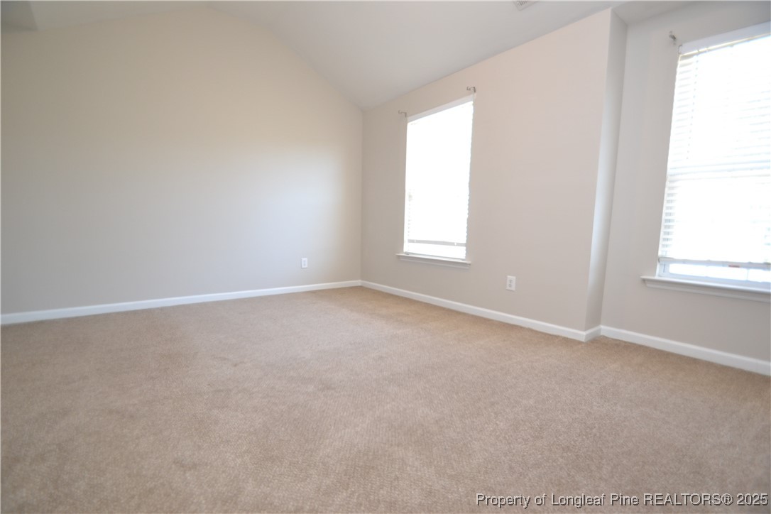 1428 Cricket Ridge Drive Raleigh, NC 27610 - Photo 33 of 47 an empty room with a window