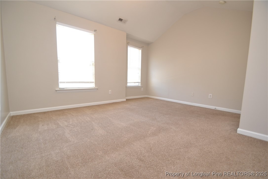 1428 Cricket Ridge Drive Raleigh, NC 27610 - Photo 36 of 47 an empty room with a window