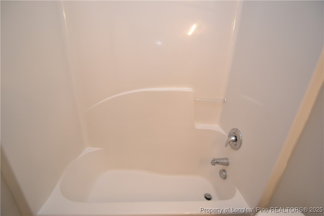 1428 Cricket Ridge Drive Raleigh, NC 27610 - Photo 38 of 47 a close up of a bathtub