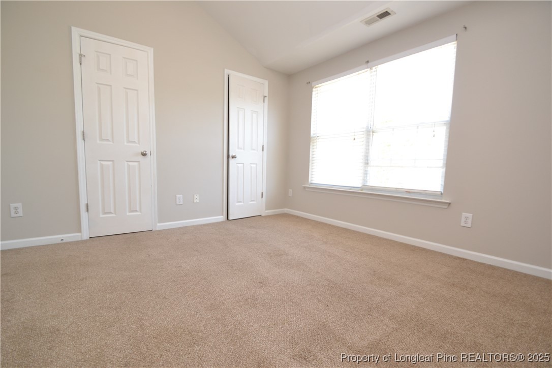 1428 Cricket Ridge Drive Raleigh, NC 27610 - Photo 41 of 47 an empty room with a window