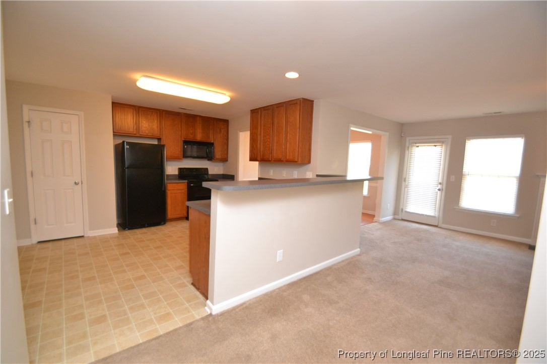 1428 Cricket Ridge Drive Raleigh, NC 27610 - Photo 5 of 47 a view of a kitchen with a sink