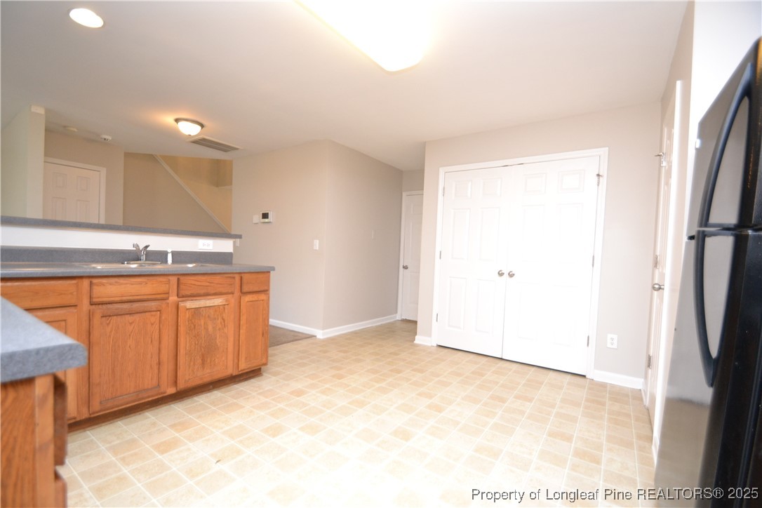 1428 Cricket Ridge Drive Raleigh, NC 27610 - Photo 9 of 47 a view of a kitchen with a sink