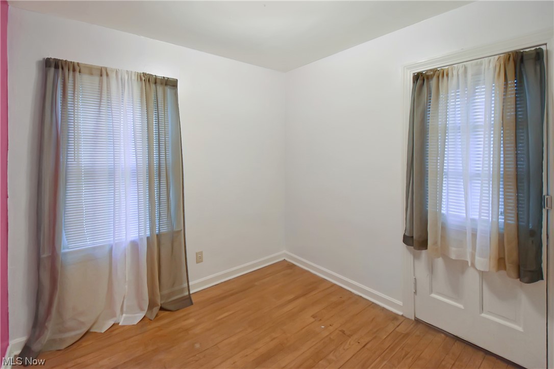 1068 Rushleigh Road Cleveland Heights, OH 44121 - Photo 15 of 22 Unfurnished room with a healthy amount of sunlight and light wood-type flooring