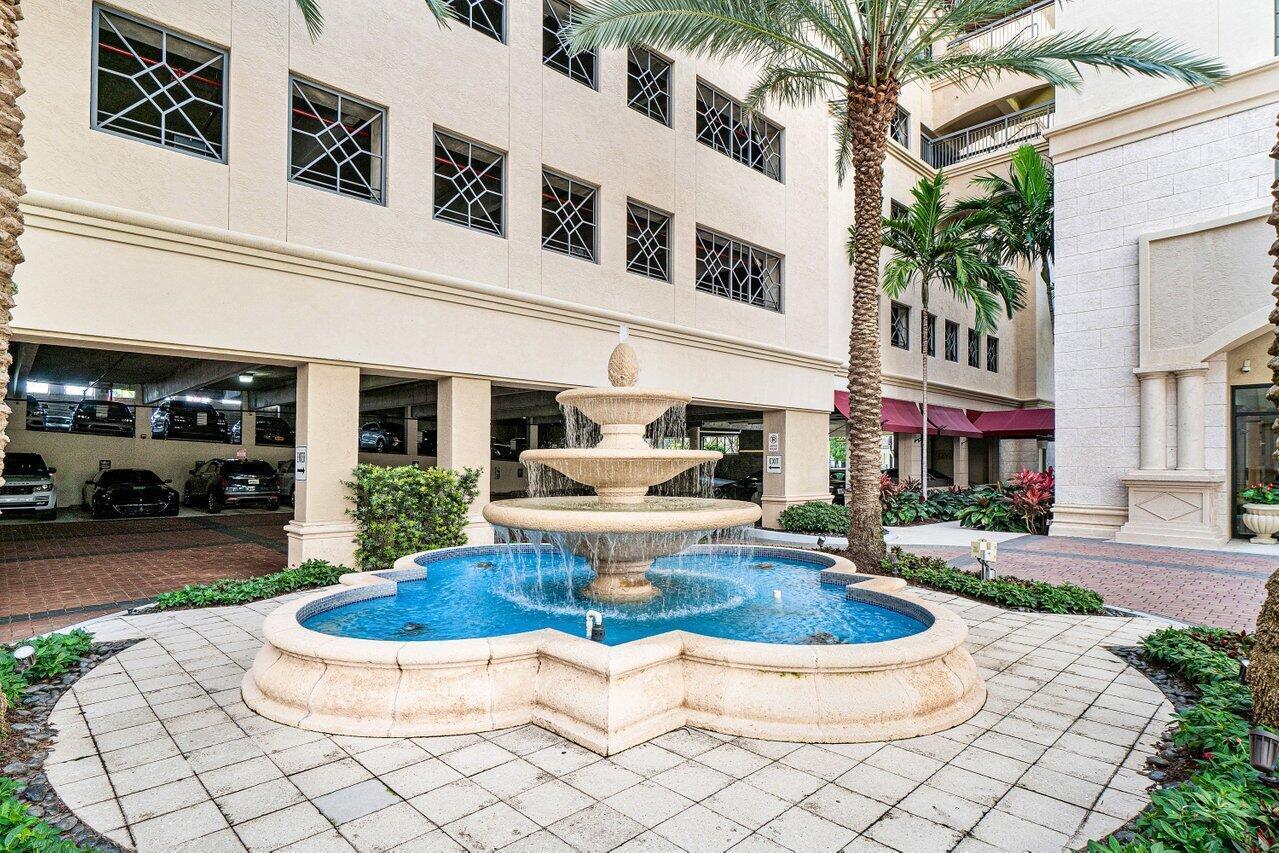 233 South Federal Highway, Unit 410 Boca Raton, FL 33432 - Photo 3 of 50 a view of a white house with swimming pool in front of it