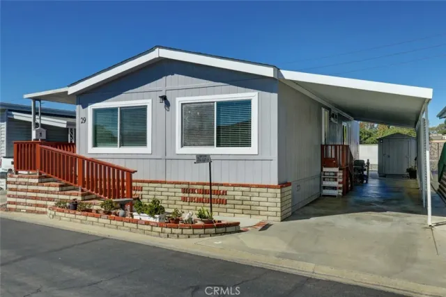 a front view of a house with garage
