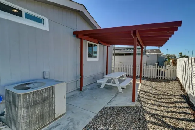 a view of a house with a small garden