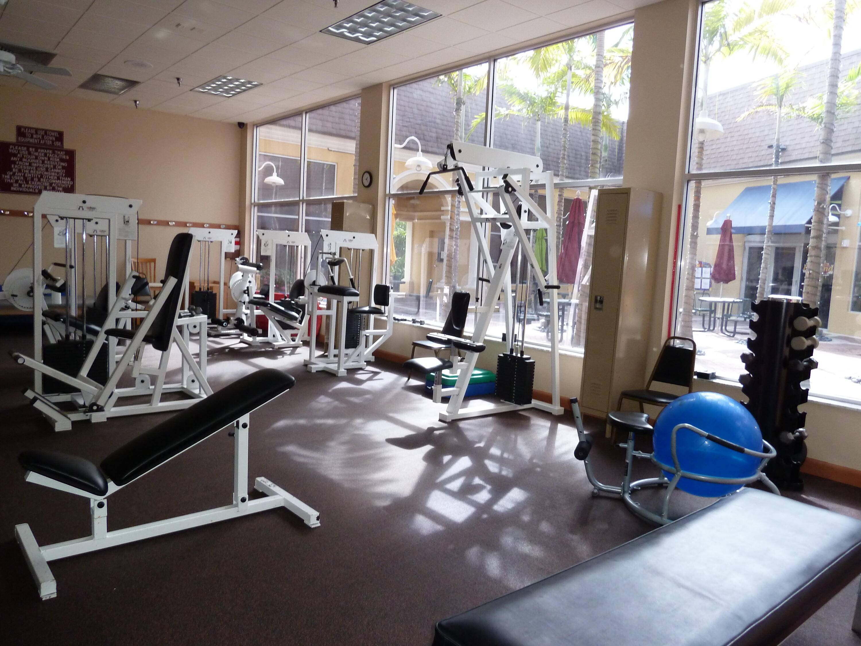 930 Normandy Trail Delray Beach, FL 33484 - Photo 23 of 34 a view of a room with gym equipment