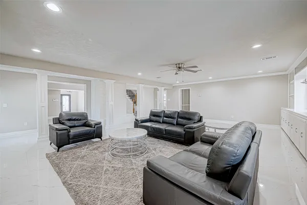 a living room with furniture and a couch