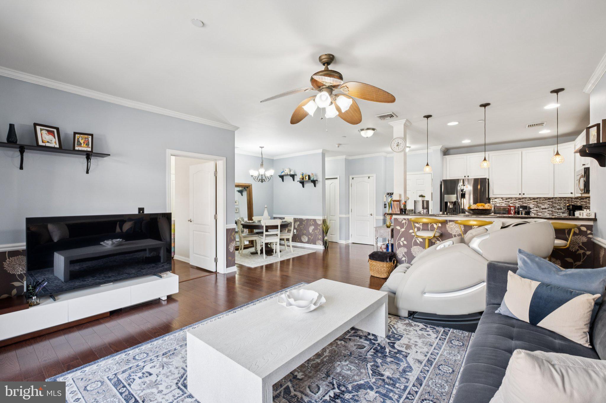 309 Carson Terrace Huntingdon Valley, PA 19006 - Photo 17 of 44 a living room with furniture kitchen view and a table