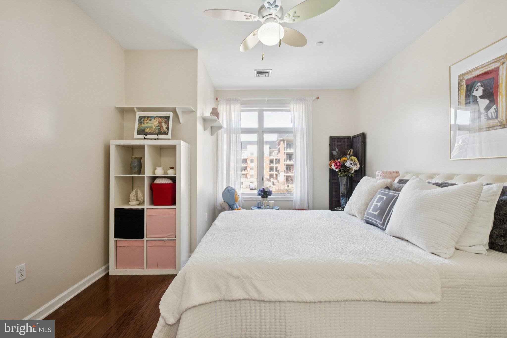 309 Carson Terrace Huntingdon Valley, PA 19006 - Photo 20 of 44 a bedroom with a large bed and a window