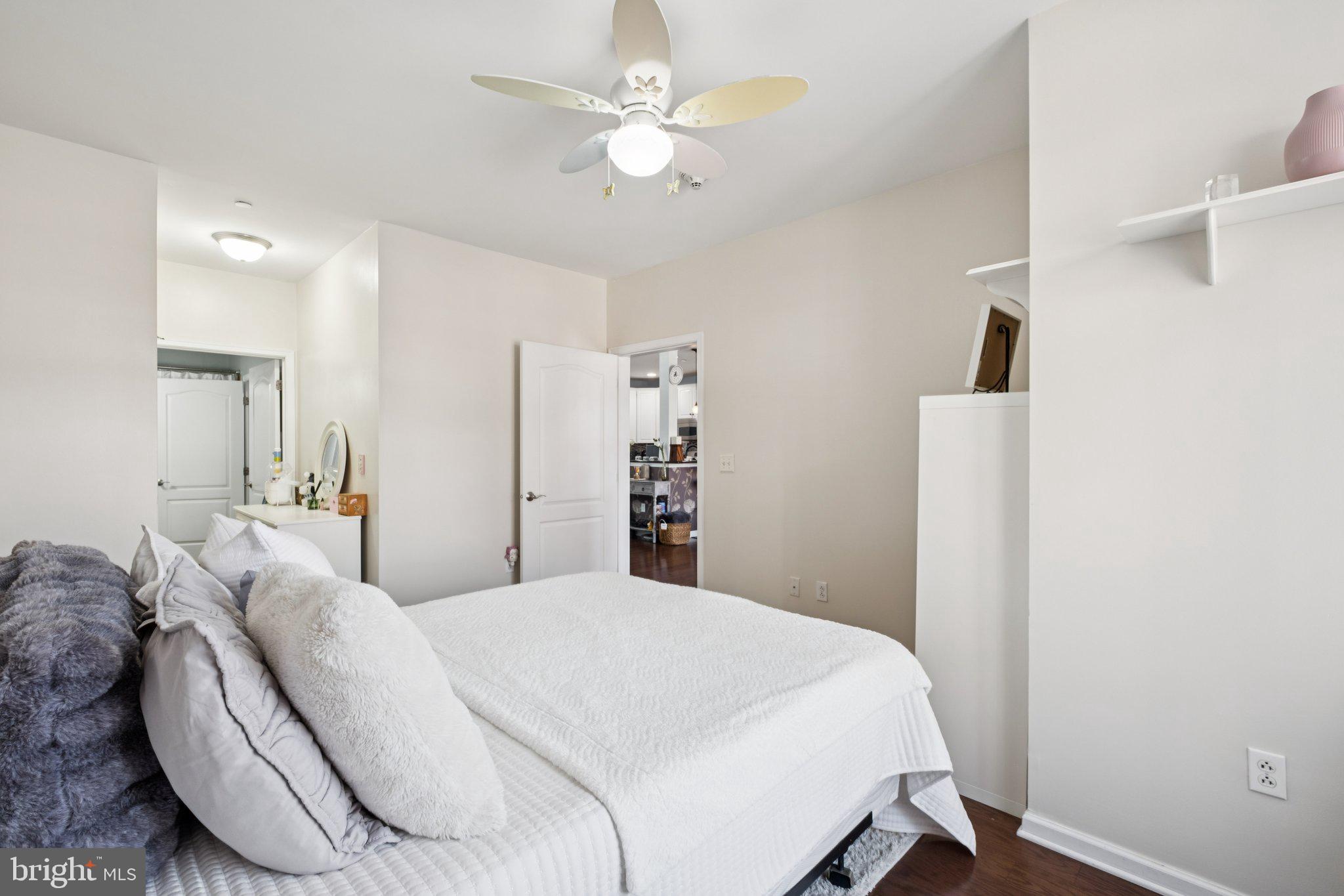 309 Carson Terrace Huntingdon Valley, PA 19006 - Photo 21 of 44 a bedroom with a bed and a chandelier