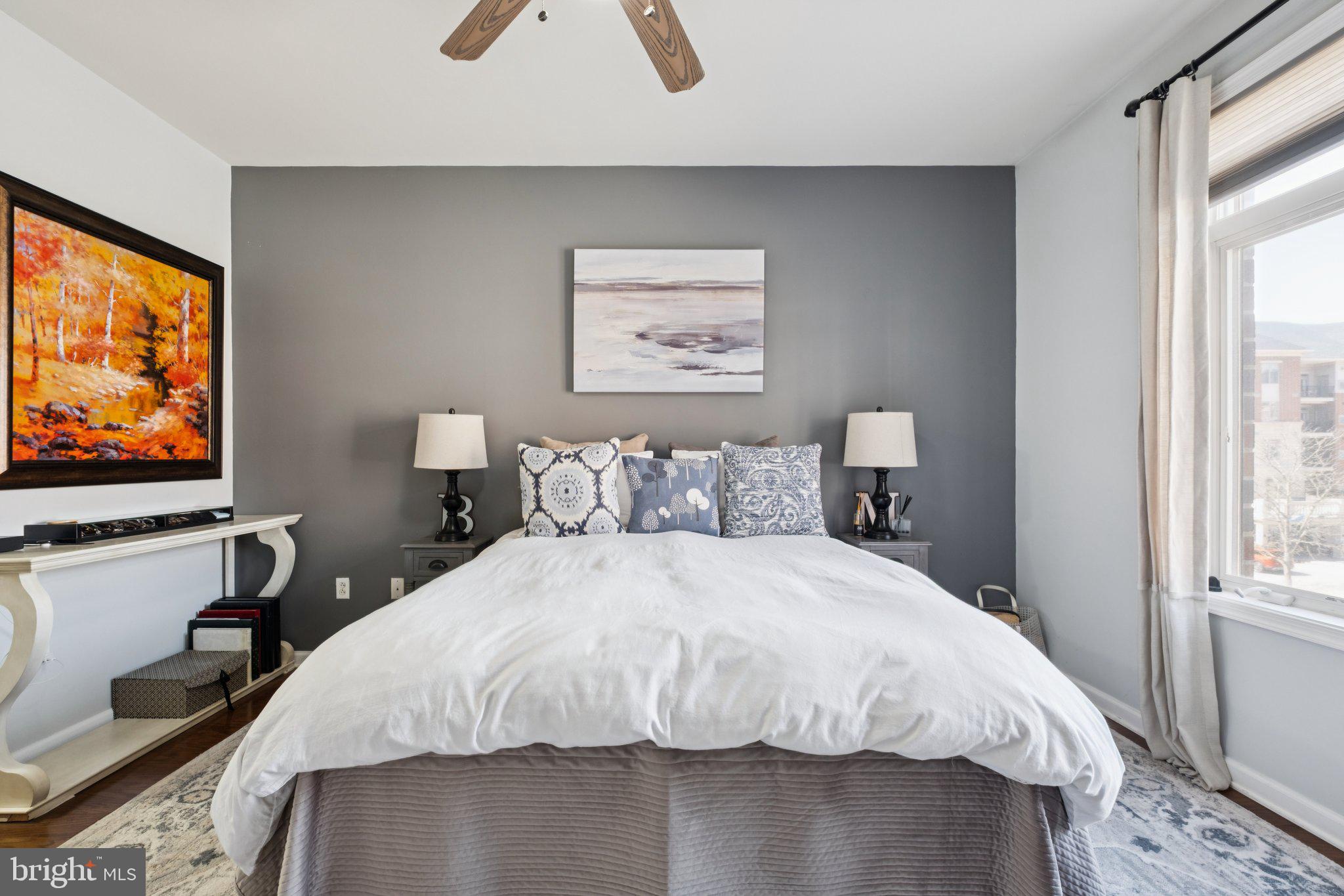 309 Carson Terrace Huntingdon Valley, PA 19006 - Photo 26 of 44 a bedroom with a bed and a flat screen tv