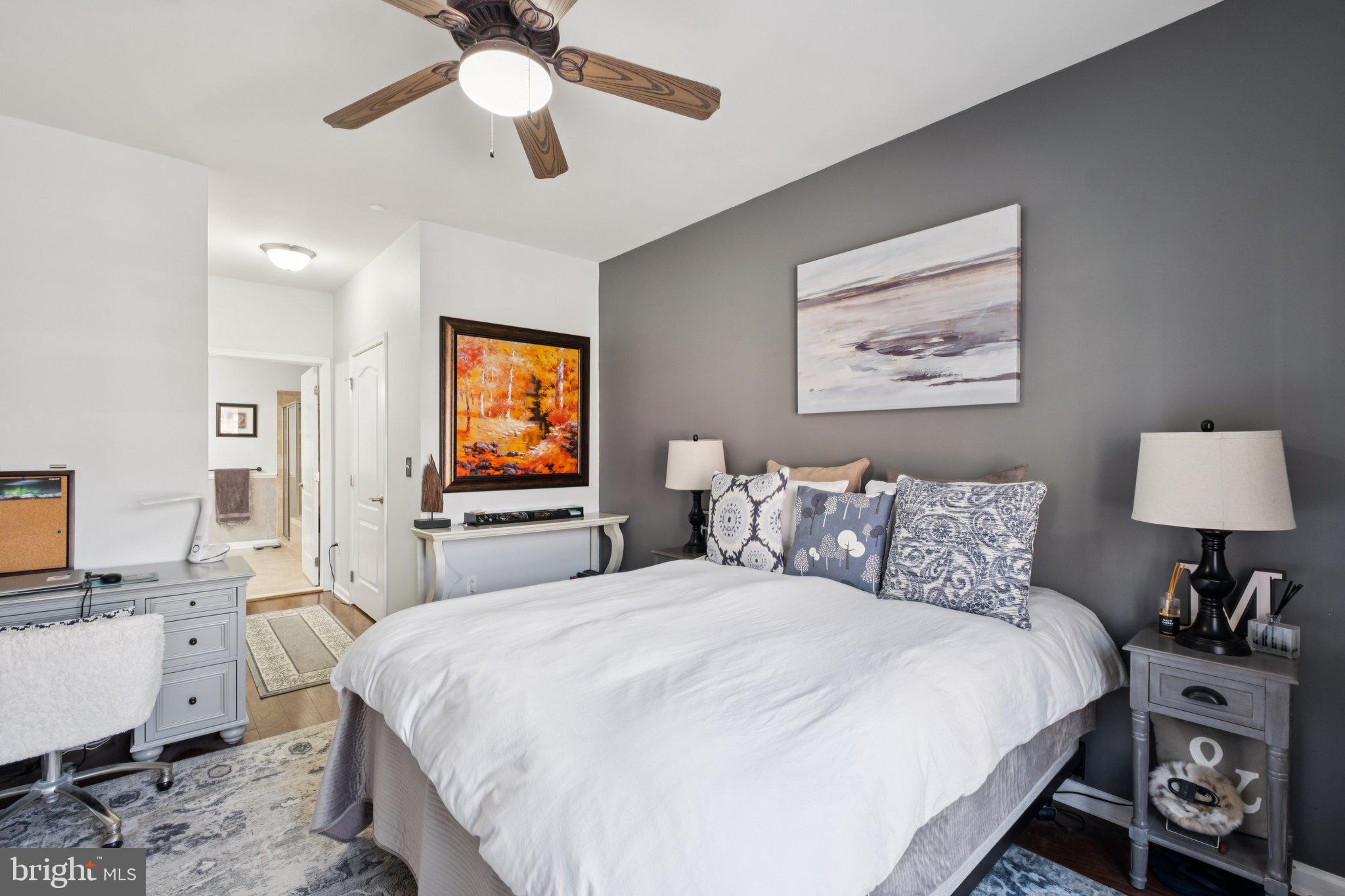 309 Carson Terrace Huntingdon Valley, PA 19006 - Photo 27 of 44 a bedroom with a bed and a flat screen tv