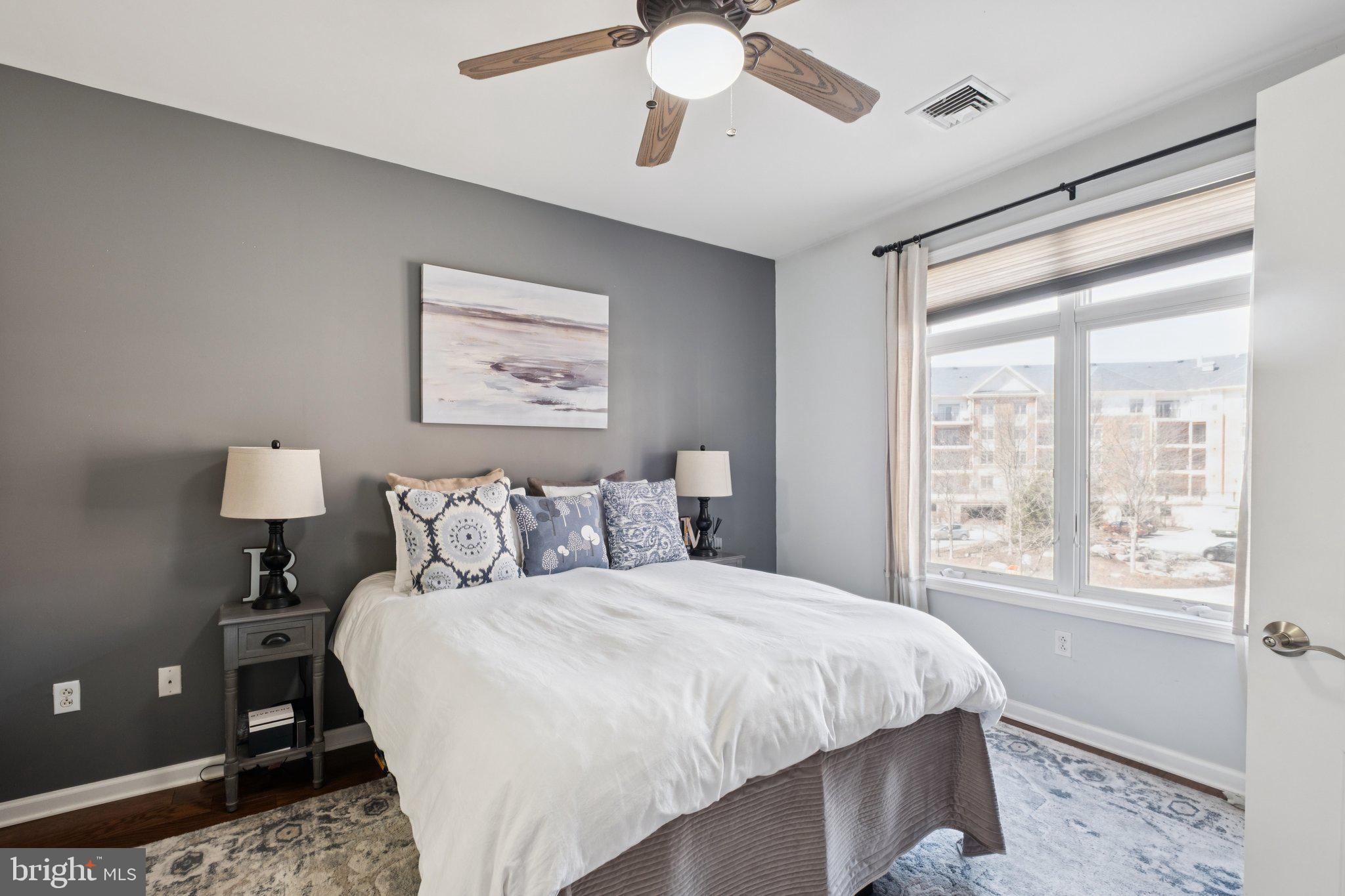 309 Carson Terrace Huntingdon Valley, PA 19006 - Photo 28 of 44 a bedroom with a large bed and a window