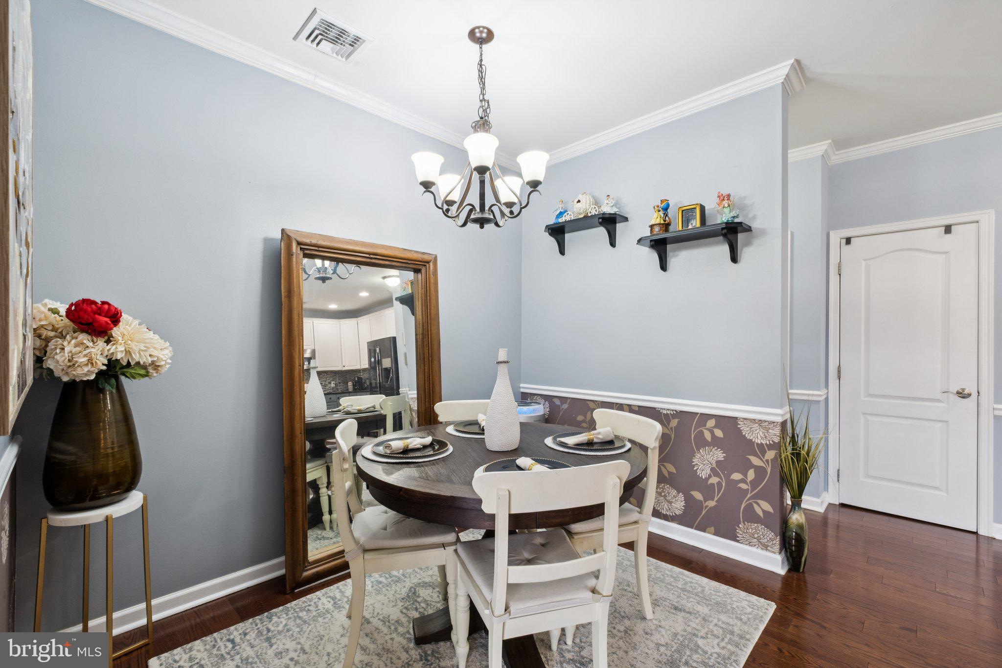 309 Carson Terrace Huntingdon Valley, PA 19006 - Photo 10 of 44 a view of a dining room with furniture and chandelier