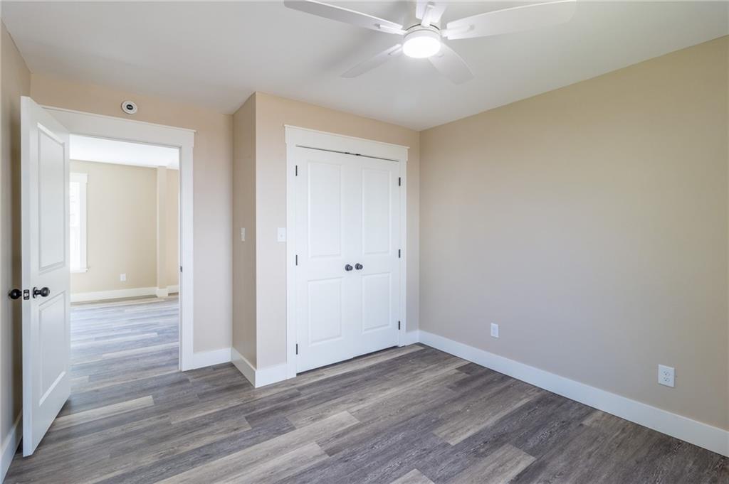 96 Orchard Road Summerville, GA 30747 - Photo 5 of 14 a view of an empty room with wooden floor