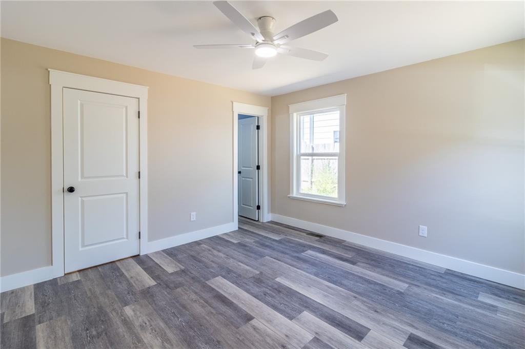 96 Orchard Road Summerville, GA 30747 - Photo 7 of 14 wooden floor in an empty room with a window